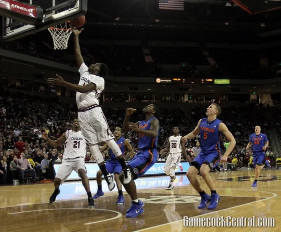 Staff photo by Paul Collins: Marcus Stroman (shooting) has led the Gamecocks in assists this year.