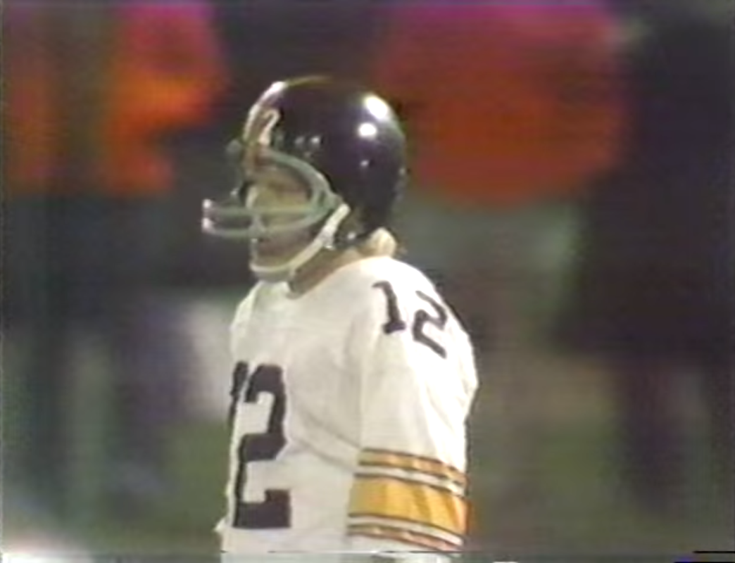 That facemask is comically small and out of place. It's protecting his nose more than his chin and mouth.