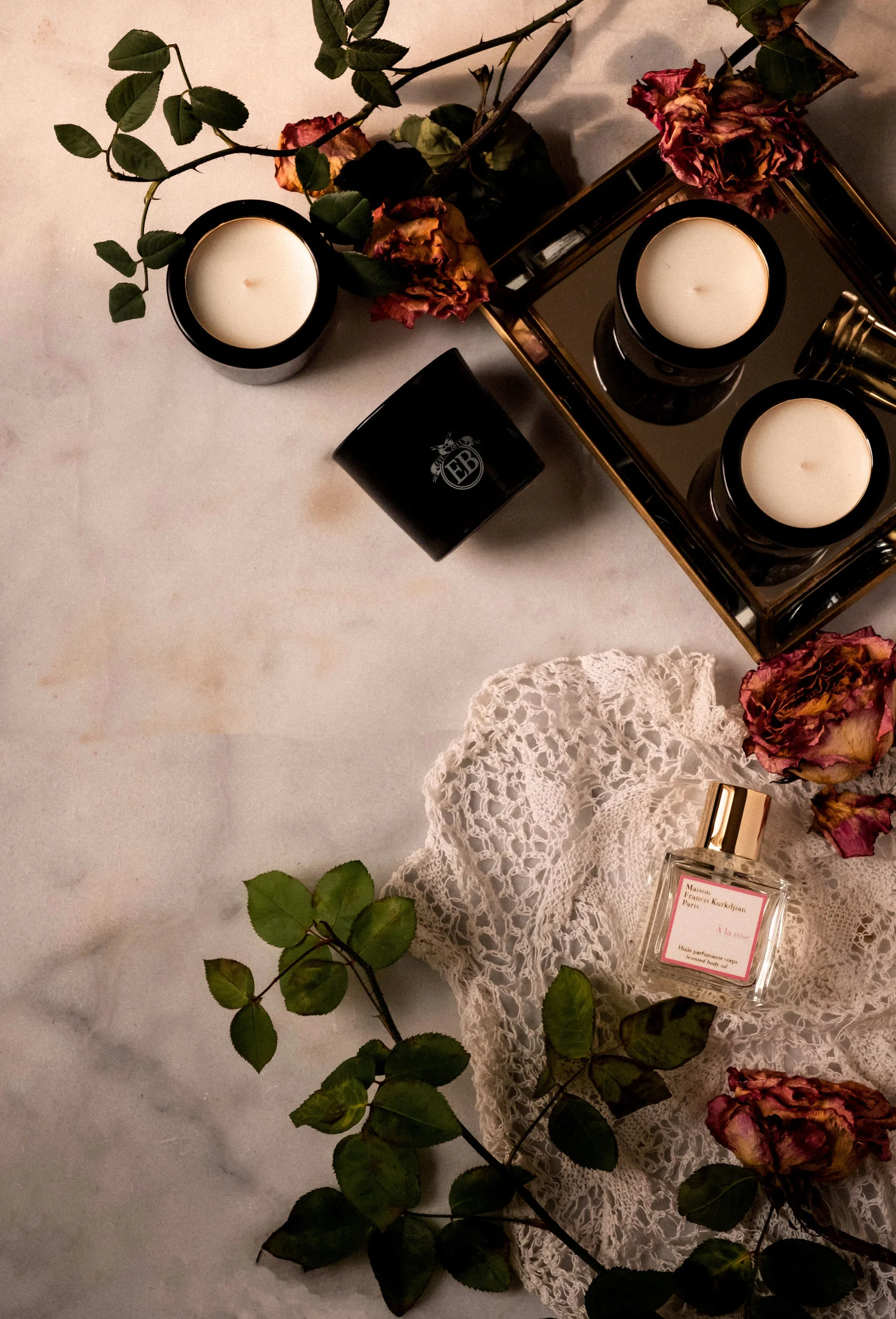 ROSE+&+IVY+Journal+Holiday+Gifting+A+Guide+of+Flowers+&+Botanicals+Maison+Kurkijan+A+la+Rose+Oil+and+Eric+Butterbaugh+Candles.jpeg