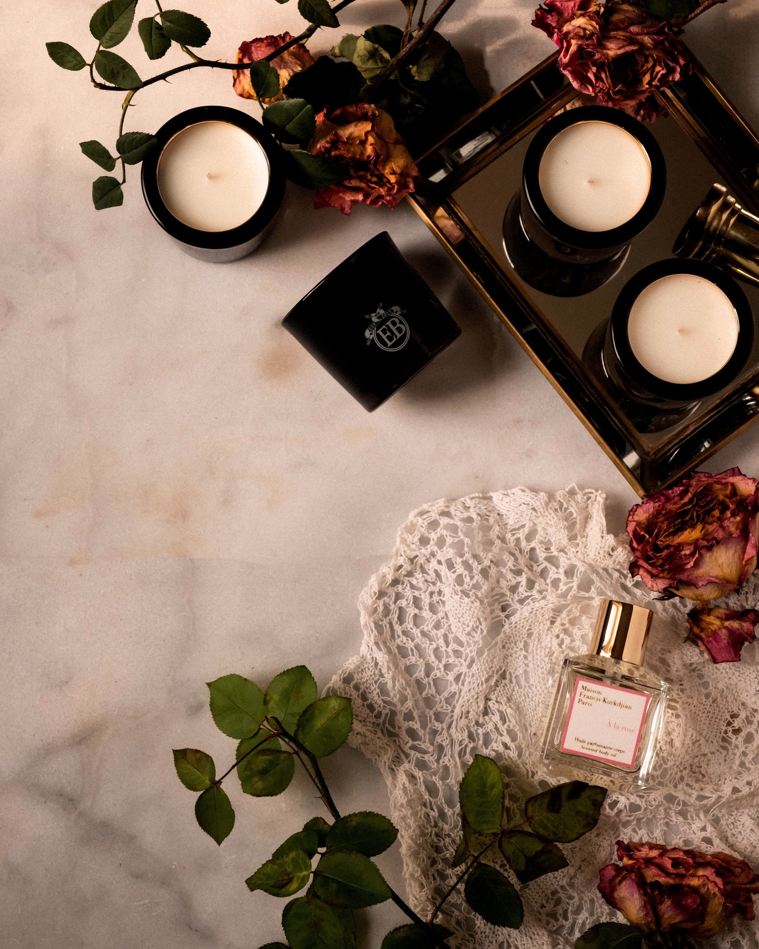 ROSE+&+IVY+Journal+Holiday+Gifting+A+Guide+of+Flowers+&+Botanicals+Maison+Kurkijan+A+la+Rose+Oil+and+Eric+Butterbaugh+Candles.jpg