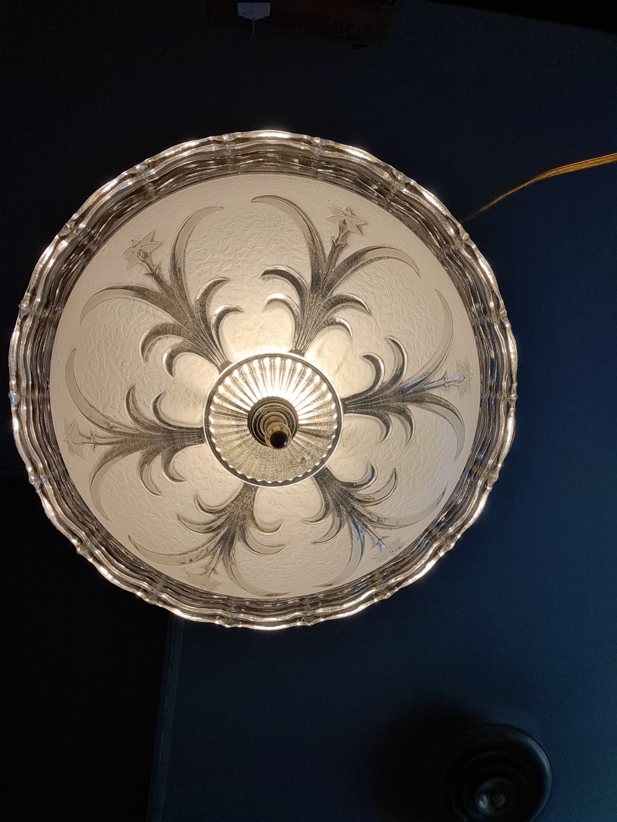 vintage frosted glass refurbished  hanging lamp bottom view illuminated the lamp shop in troy