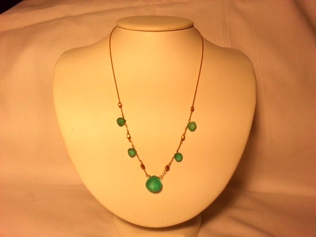 Genuine emerald and gold necklace sold for $500. This was one of many beautiful pieces of jewelry at this year's auction.