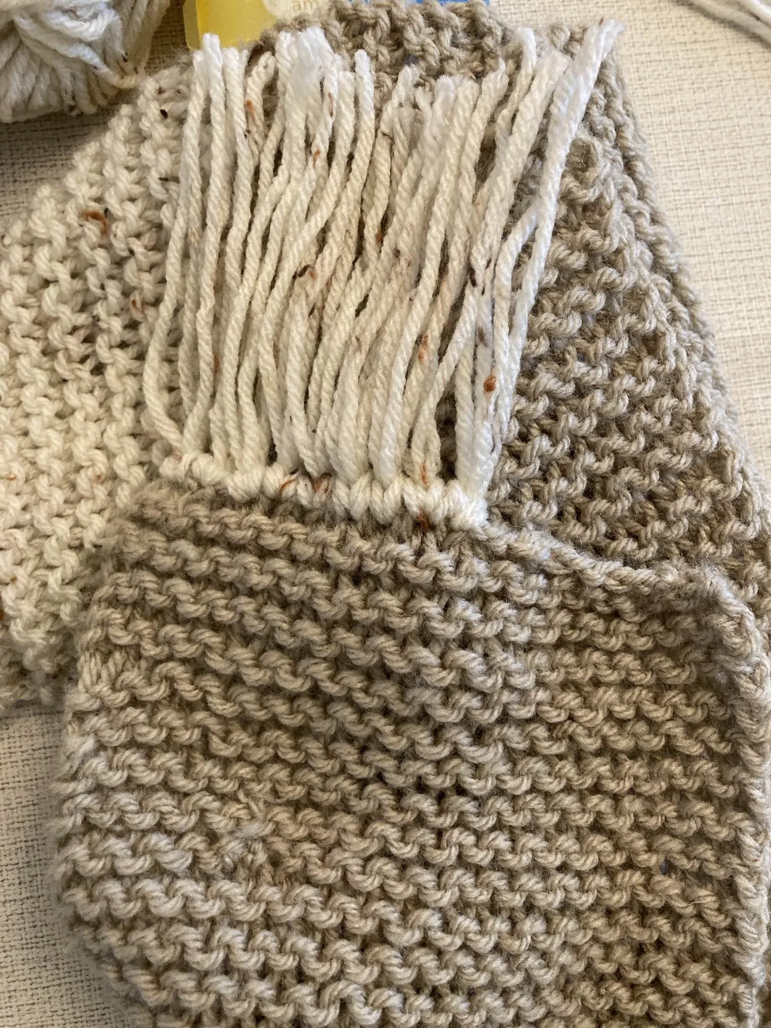 Naomi continued to be crafty and added fringe to a new scarf.