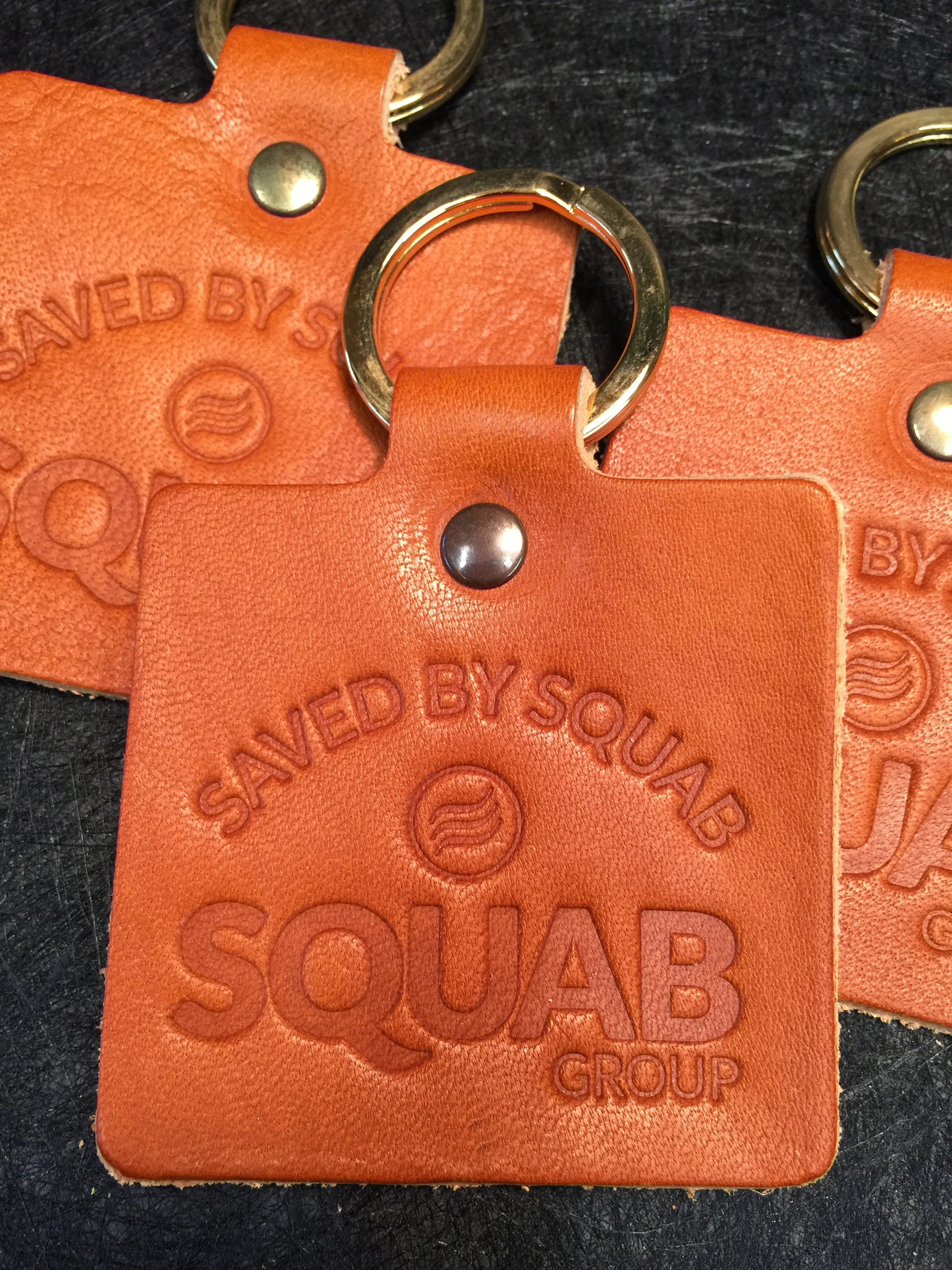 © FizzArrow Key rings for Squab Group
