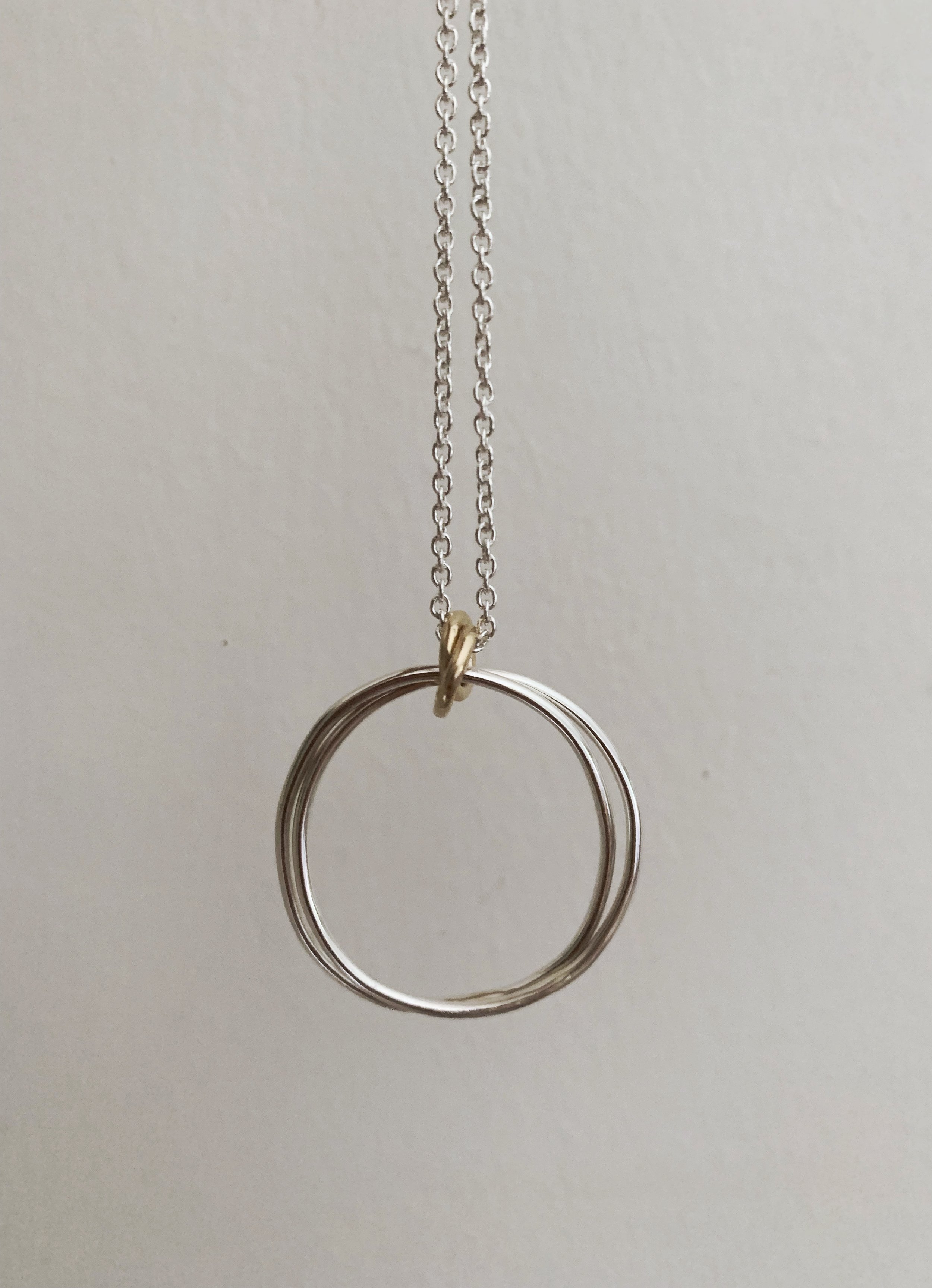 Jika bespoke custom silver and gold necklace interlocked rings .jpeg