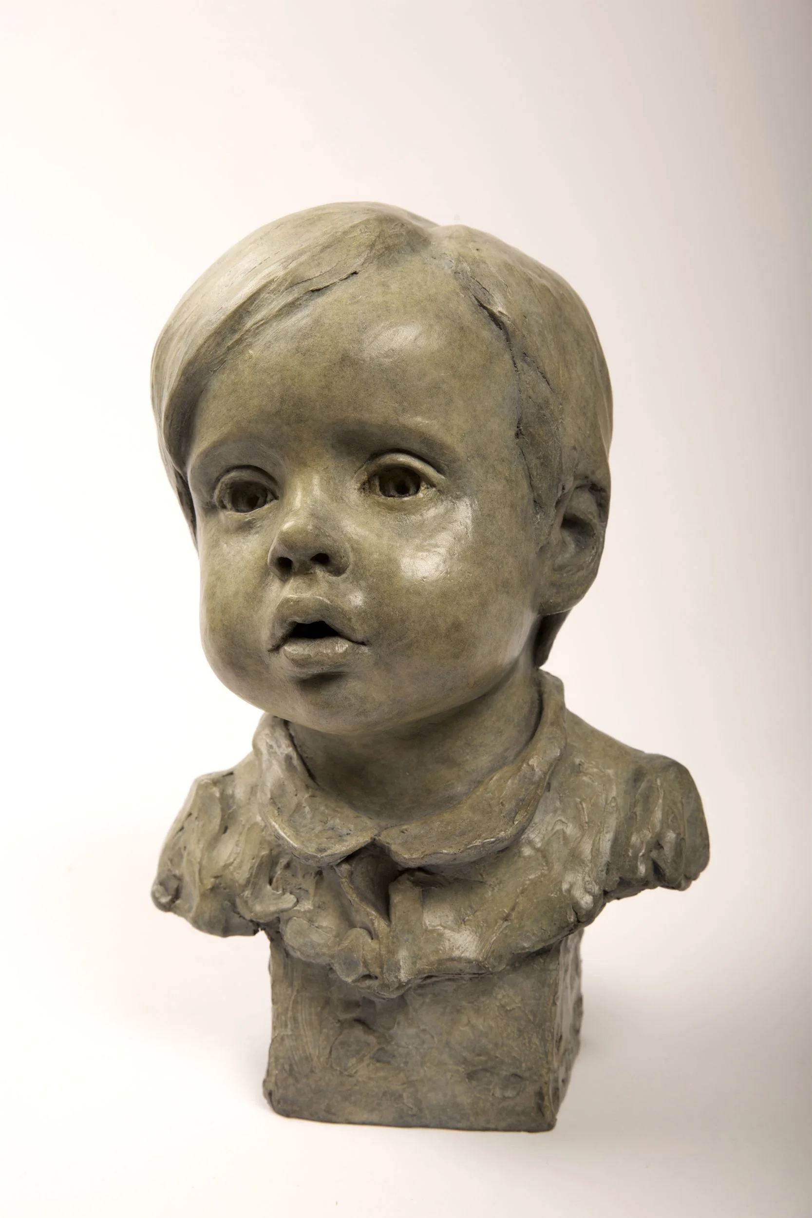 The value of owning a bronze portrait of a family member is difficult to overstate. There is no more personal and precious a way to capture a moment in time. My aim is to imbue my bronze portraits with the personality of the subject; creating a unique piece of art to be treasured for generations. From the initial sitting to the final patination of the bronze I will keep you involved and updated throughout the whole fascinating process. To commission a portrait sculpture please contact me to discuss your ideas 