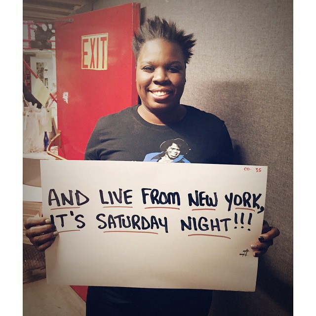 Leslie Jones posing with the cue card from her first ever "LIVE FROM NEW YORK, IT'S SATURDAY NIGHT!"
