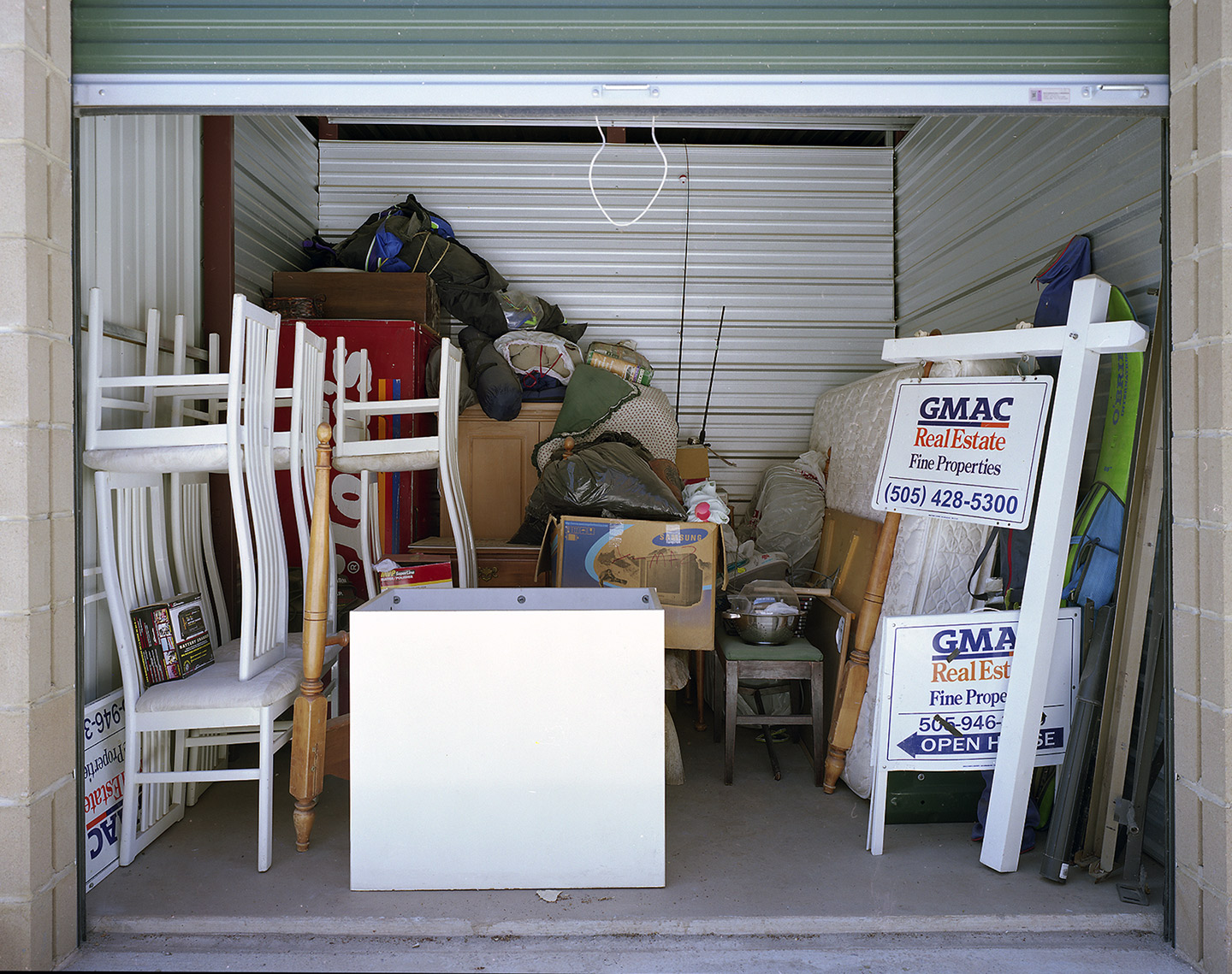 People use self-storage to store their stuff, often in response to disruptions in their domestic lives. But when unemployment, foreclosure, and other calamities force people out of their homes, storage units can be appropriated for new uses. 