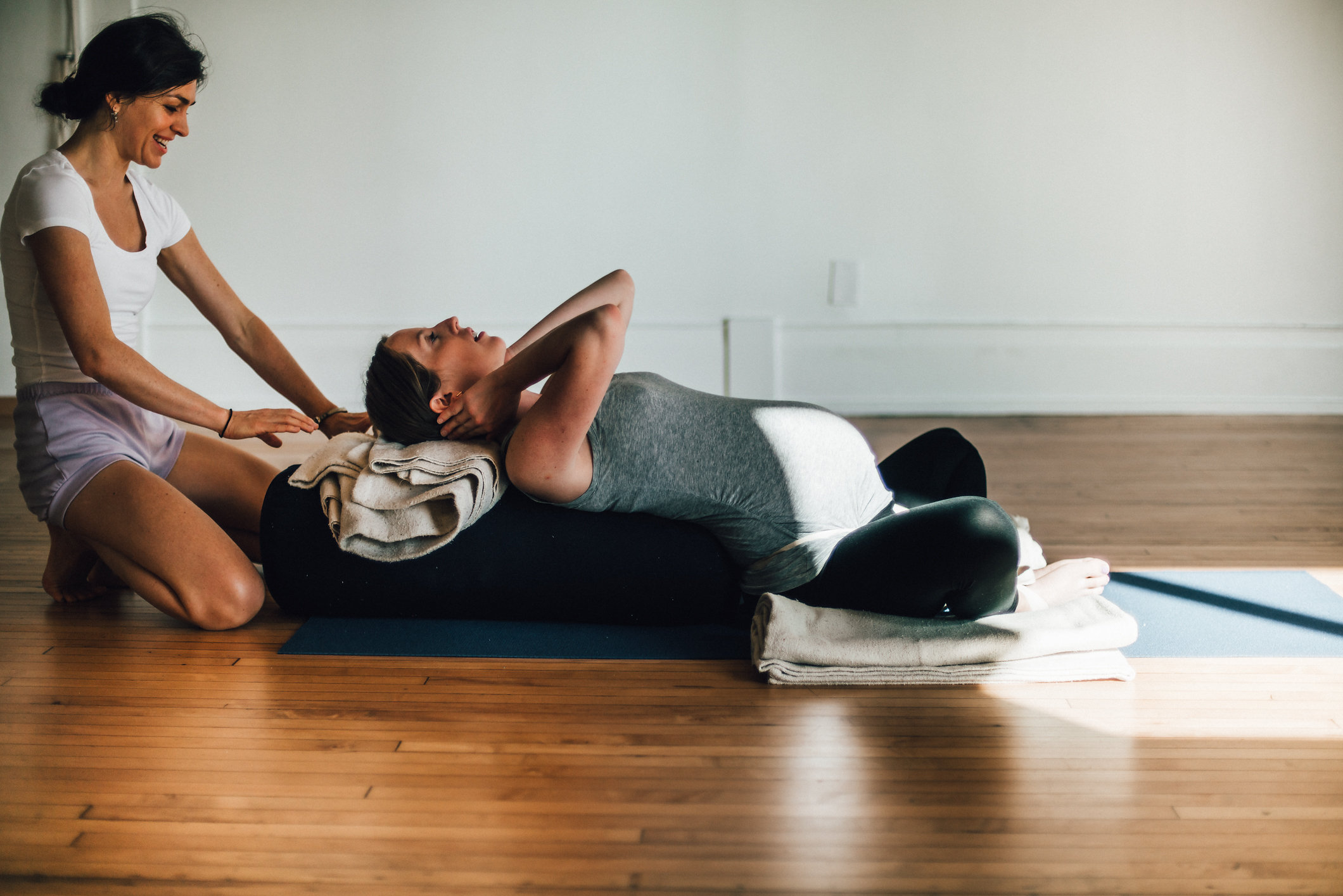 Jennifer Beaumont teaching Prenatal Yoga. Photo by Matthew Provoast Photography.