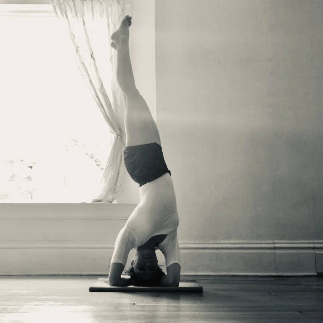 Parsva Sirsasana "Head balance to the side posture"