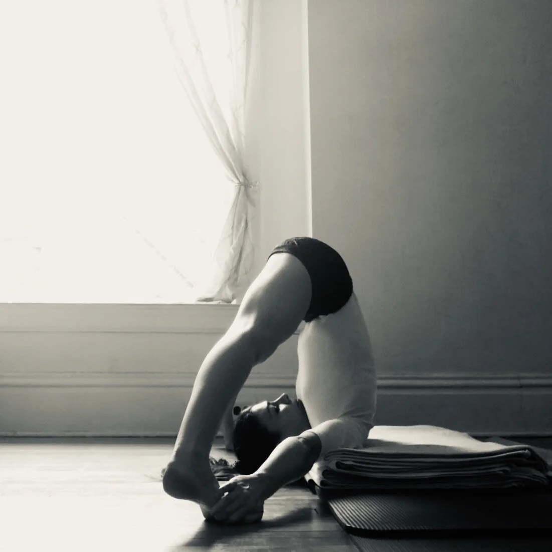 Supta Konasana - "reclining wide angle pose"