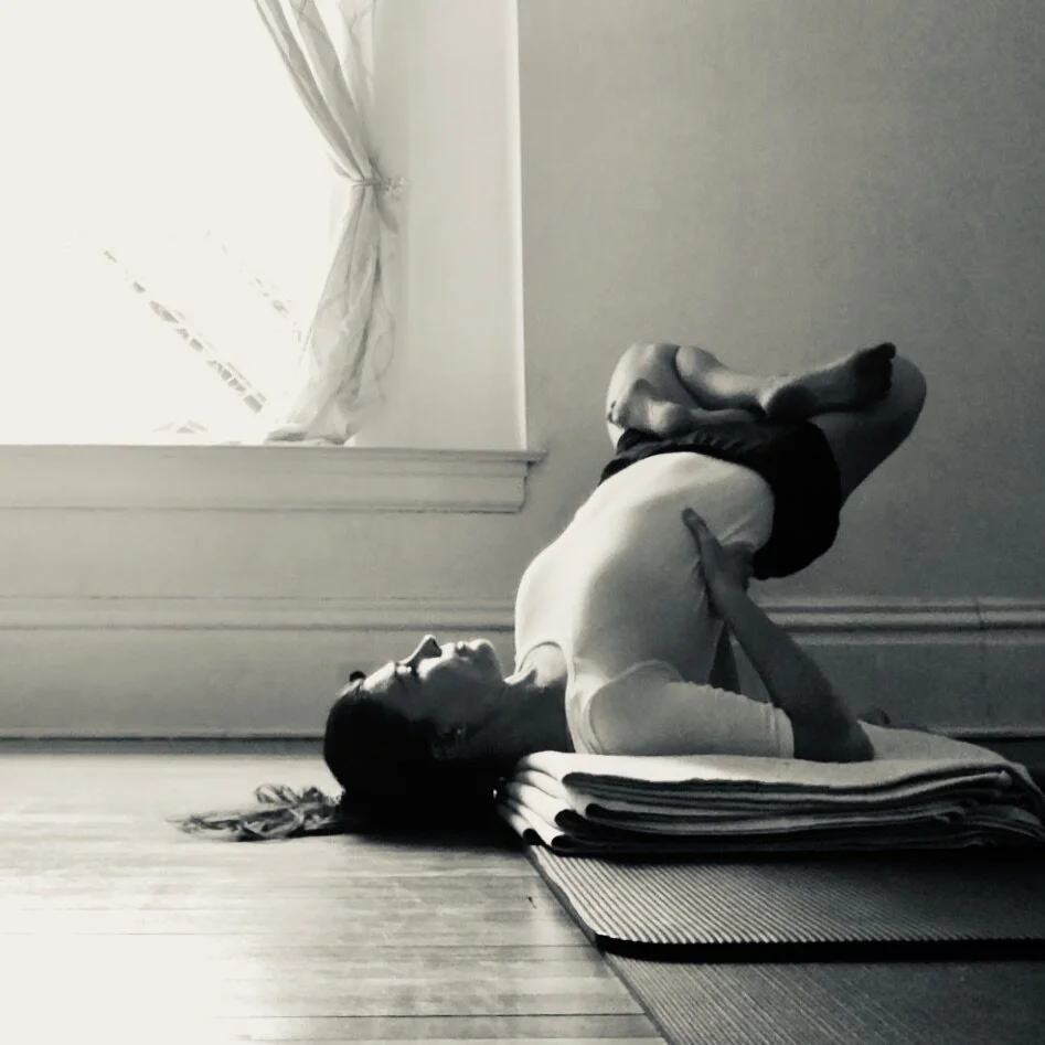 Parsva Urdhva Padmasana in Sarvangasana "Side Upward Lotus in Sarvangasana"
