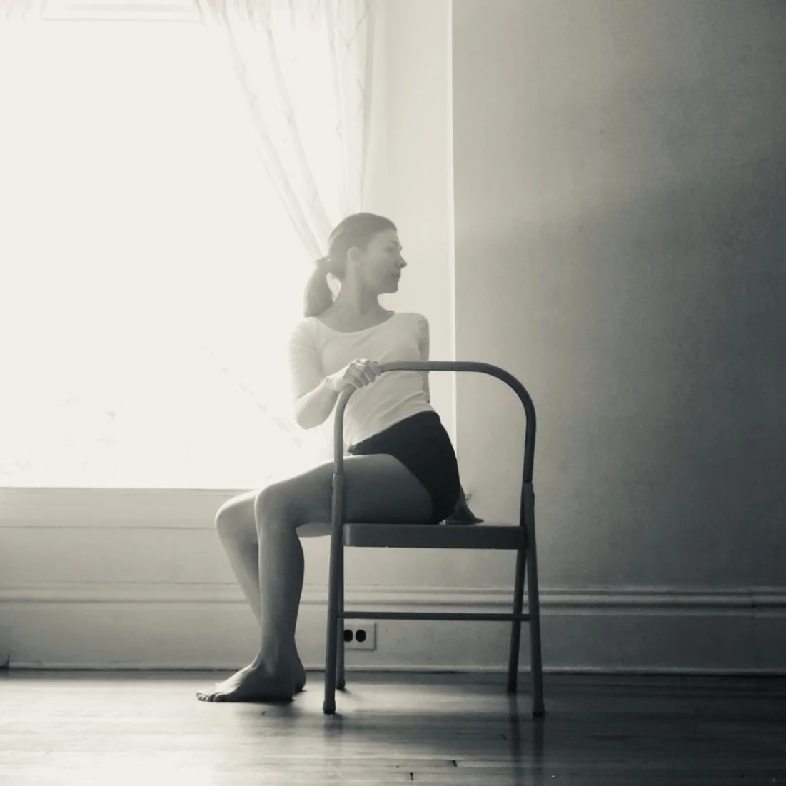 Bharadvajasana chair twist