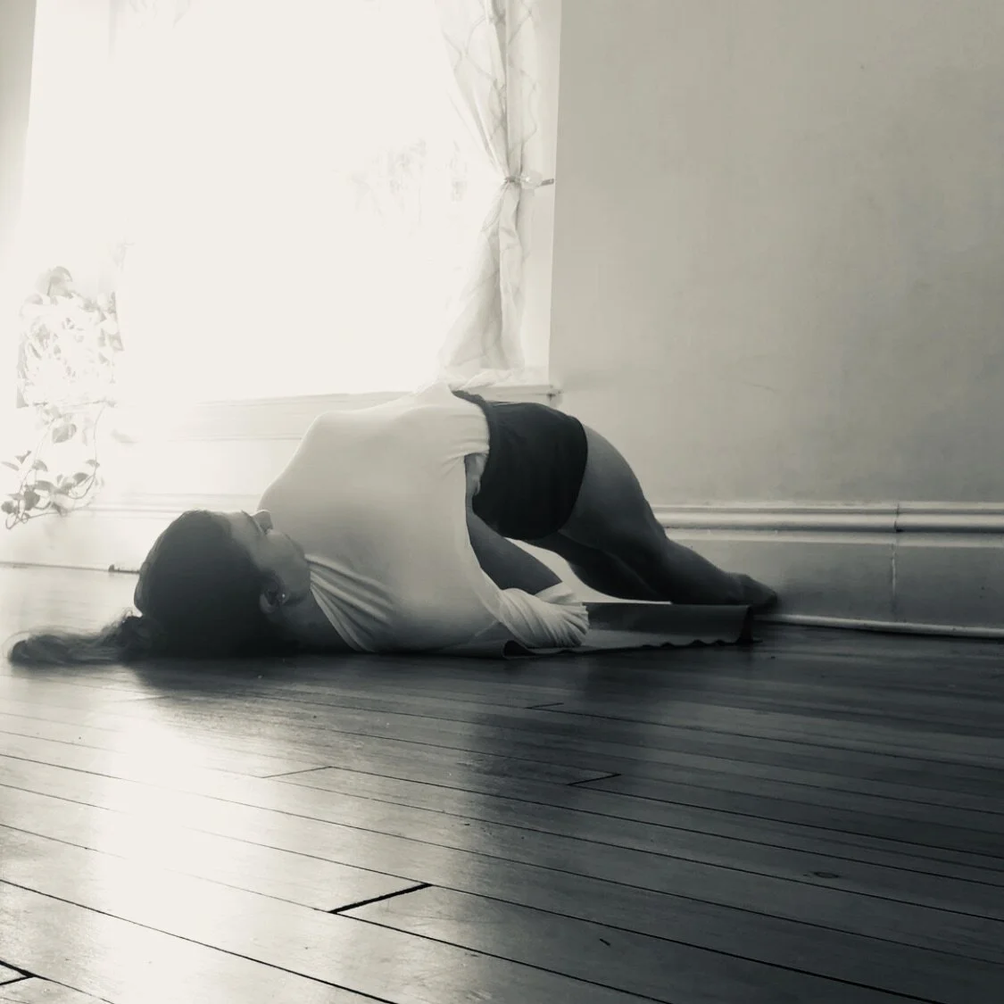 Setu Bandha Sarvangasana with wall support