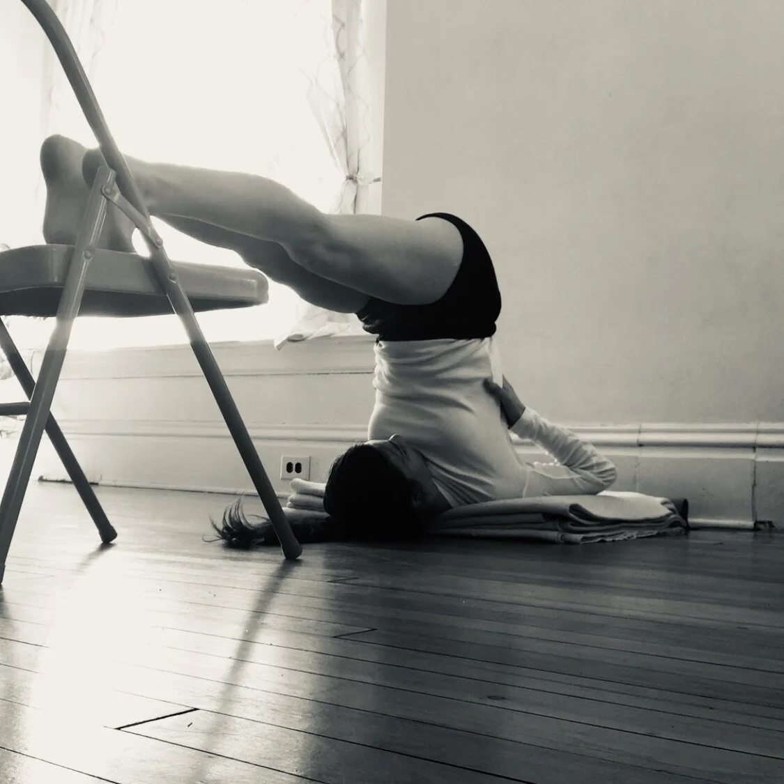 Ardha Halasana with support