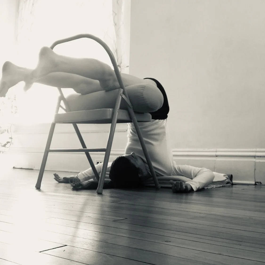 Ardha Halasana with support