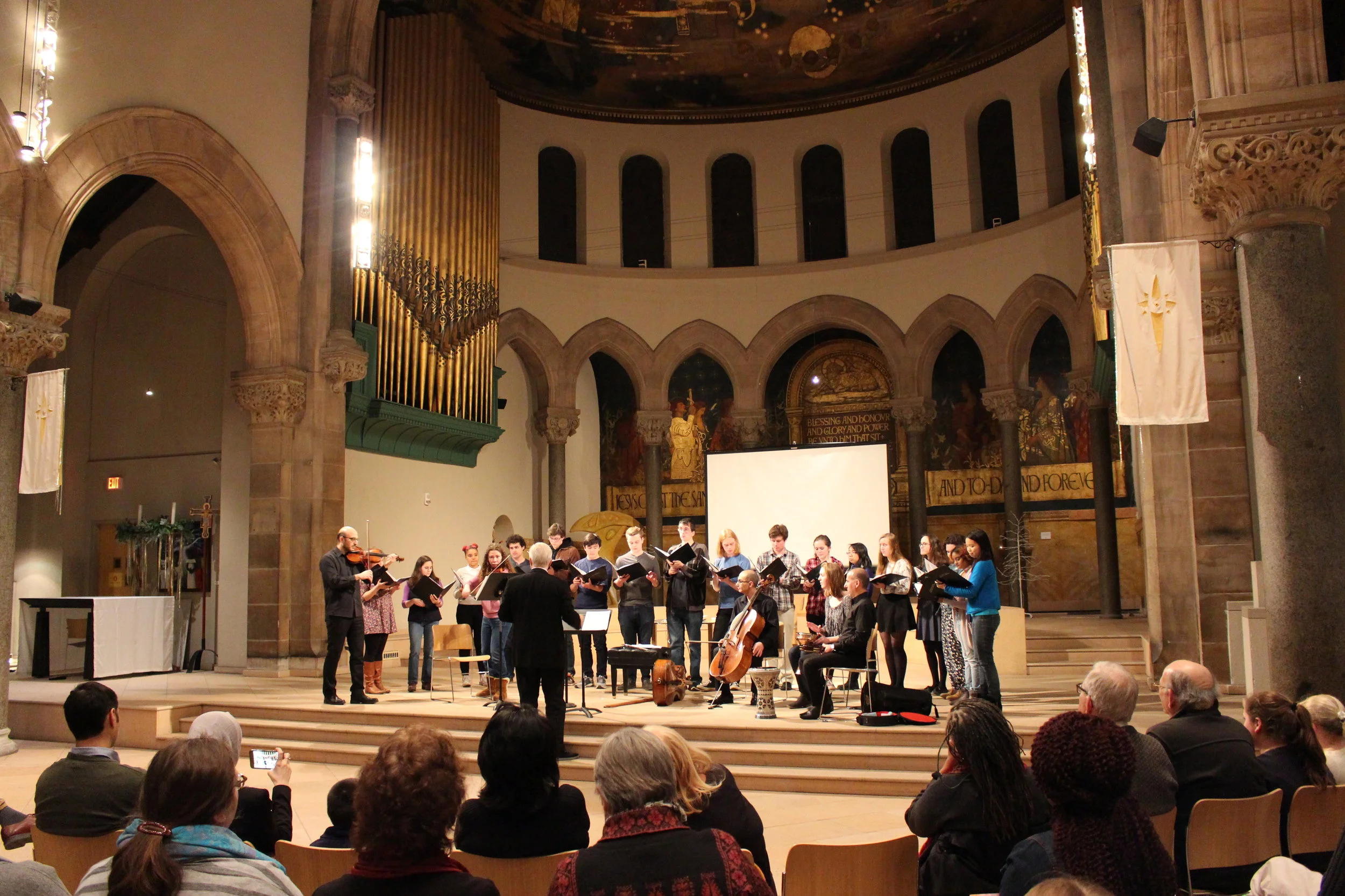 Chamber Singers performing "Vogelgesang" (an arrangement of a German folksong with a Syrian folksong) with the Al Bustan takht ensemble and Thomas Lloyd conducting.
