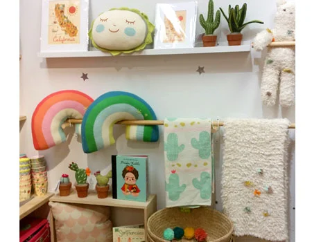 Cactus themed interior display for nursery/room decor section of the store. Featuring a muted pastel color palette and desert wall art and home accessories. Spring/Summer 2018.