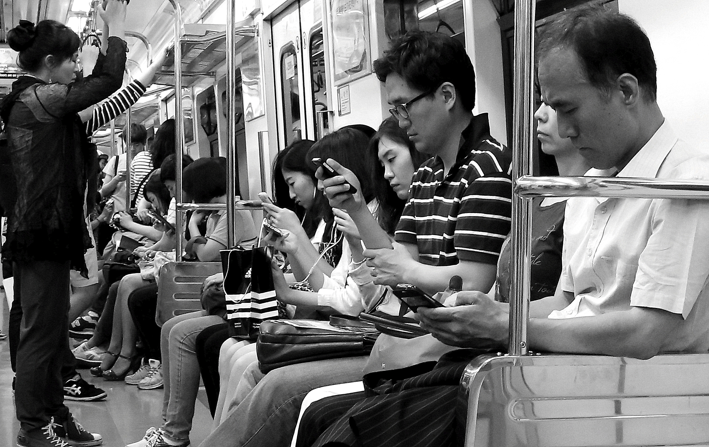 Commuters on train in Seoul