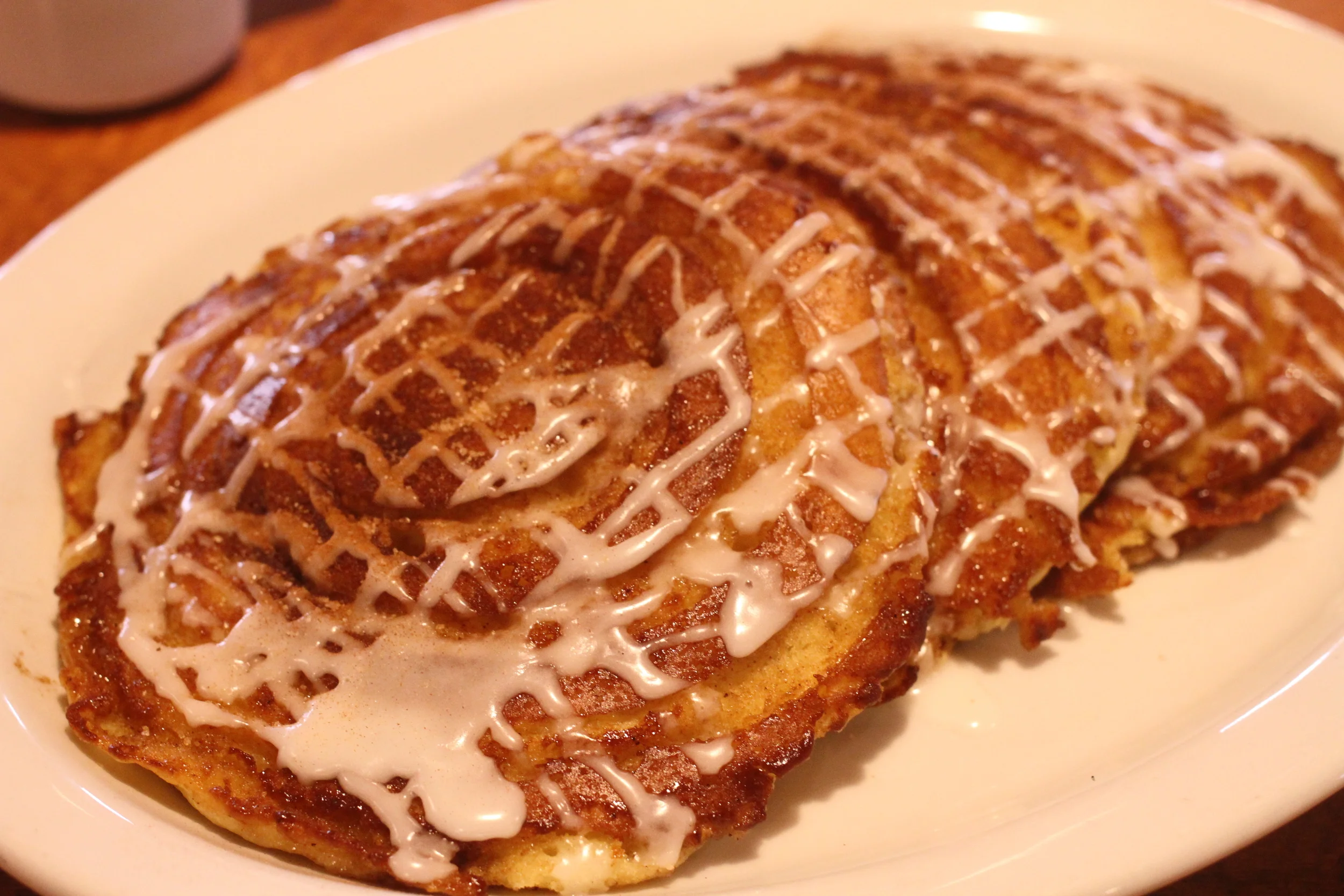 Keno's *NEW* Cinnamon Roll Pancakes! Now Available All Day Saturday-Sunday & Monday-Friday until 11AM