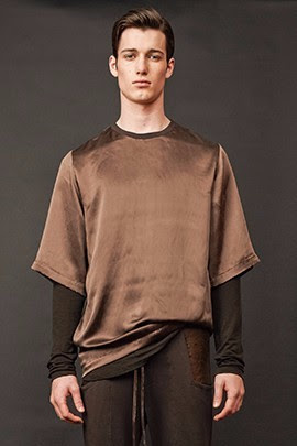 Travis Taddeo TRAVIS TADDEO has gained a loyal following among fashion risk-takers by pushing and overcoming the conventional expectations established for Canadian fashion design. Known for his combination of minimal lines and distinctive blends of silk, jersey, leather and fur, Taddeo offers simplicity with edge by creating a bold marriage between luxury and street-wear.