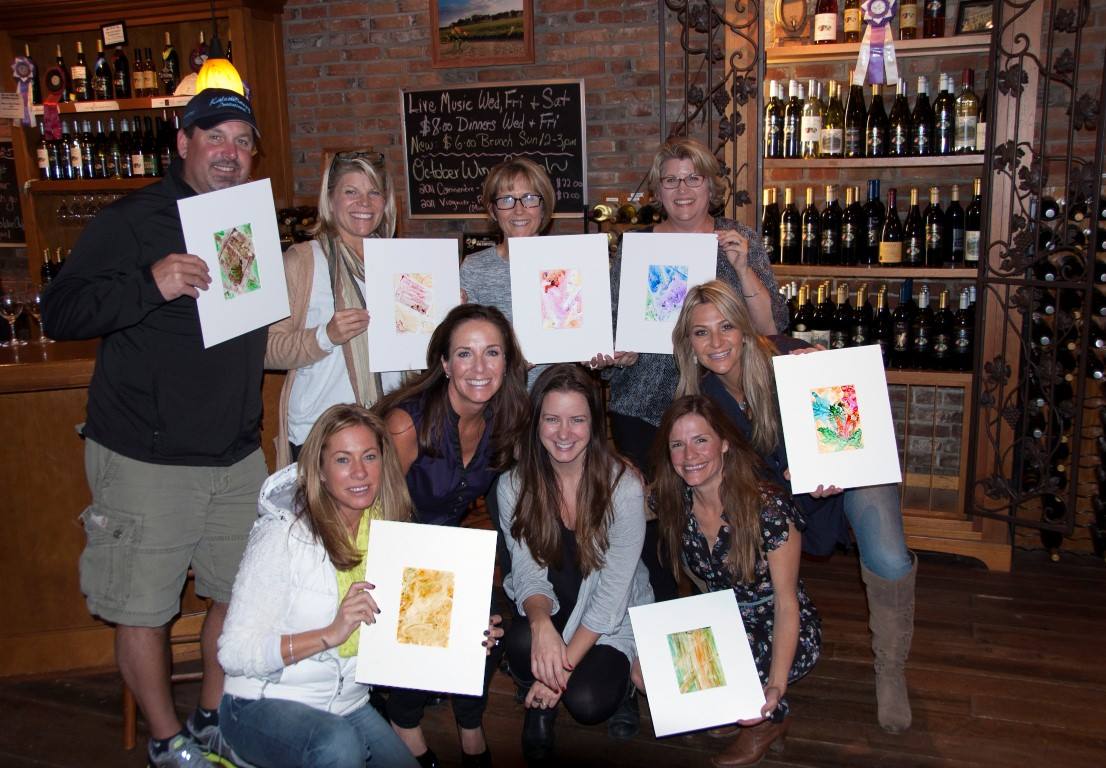 A whole class full of wonderfully individual abstract watercolor paintings.