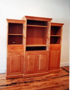 handmade hardwood cherry media cabinet with stepped facade and cove moulding
