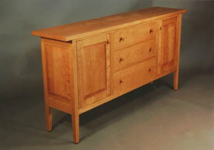 handmade hardwood cherry Shaker sideboard with tapered legs and frame and panel doors