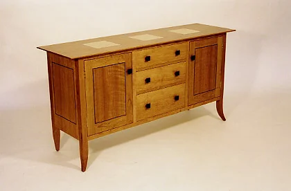 handmade hardwood cherry sideboard with inlay detail on doors and curly maple inlaid squares on top