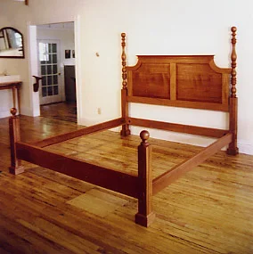 handmade hardwood cherry bed with cannonball posts