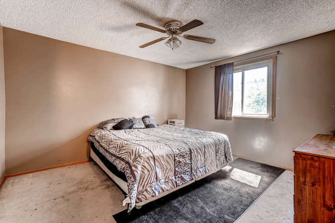 4504 Eagle St Denver CO 80239-small-014-18-2nd Floor Master Bedroom-666x444-72dpi.jpg