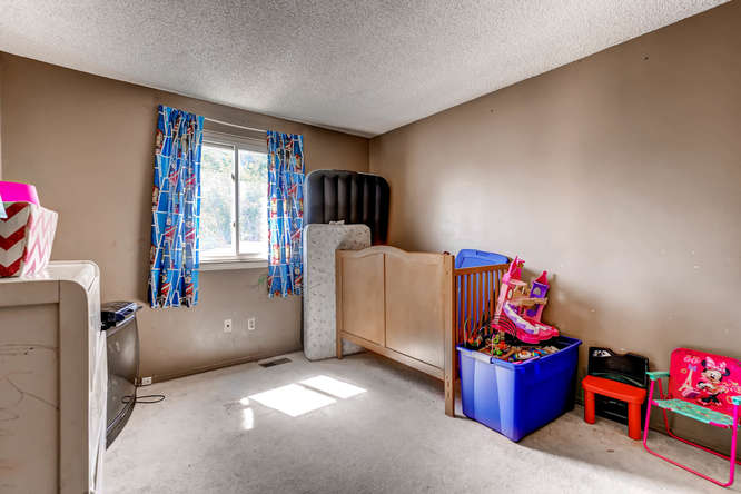 4504 Eagle St Denver CO 80239-small-018-10-2nd Floor Bedroom-666x444-72dpi.jpg