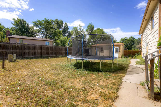 4504 Eagle St Denver CO 80239-small-025-23-Back Yard-666x444-72dpi.jpg