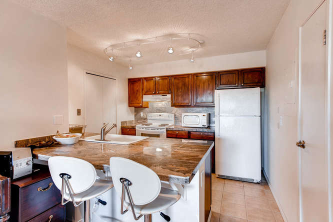 7420 E Quincy Ave 203 Denver-small-006-3-Kitchen-666x444-72dpi.jpg