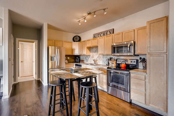 7140 S Wenatchee Way Unit H-small-004-9-Kitchen-666x444-72dpi.jpg