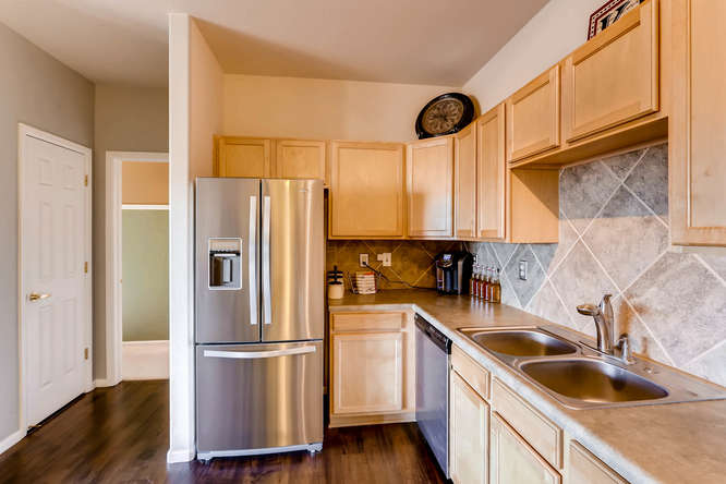 7140 S Wenatchee Way Unit H-small-005-7-Kitchen-666x444-72dpi.jpg