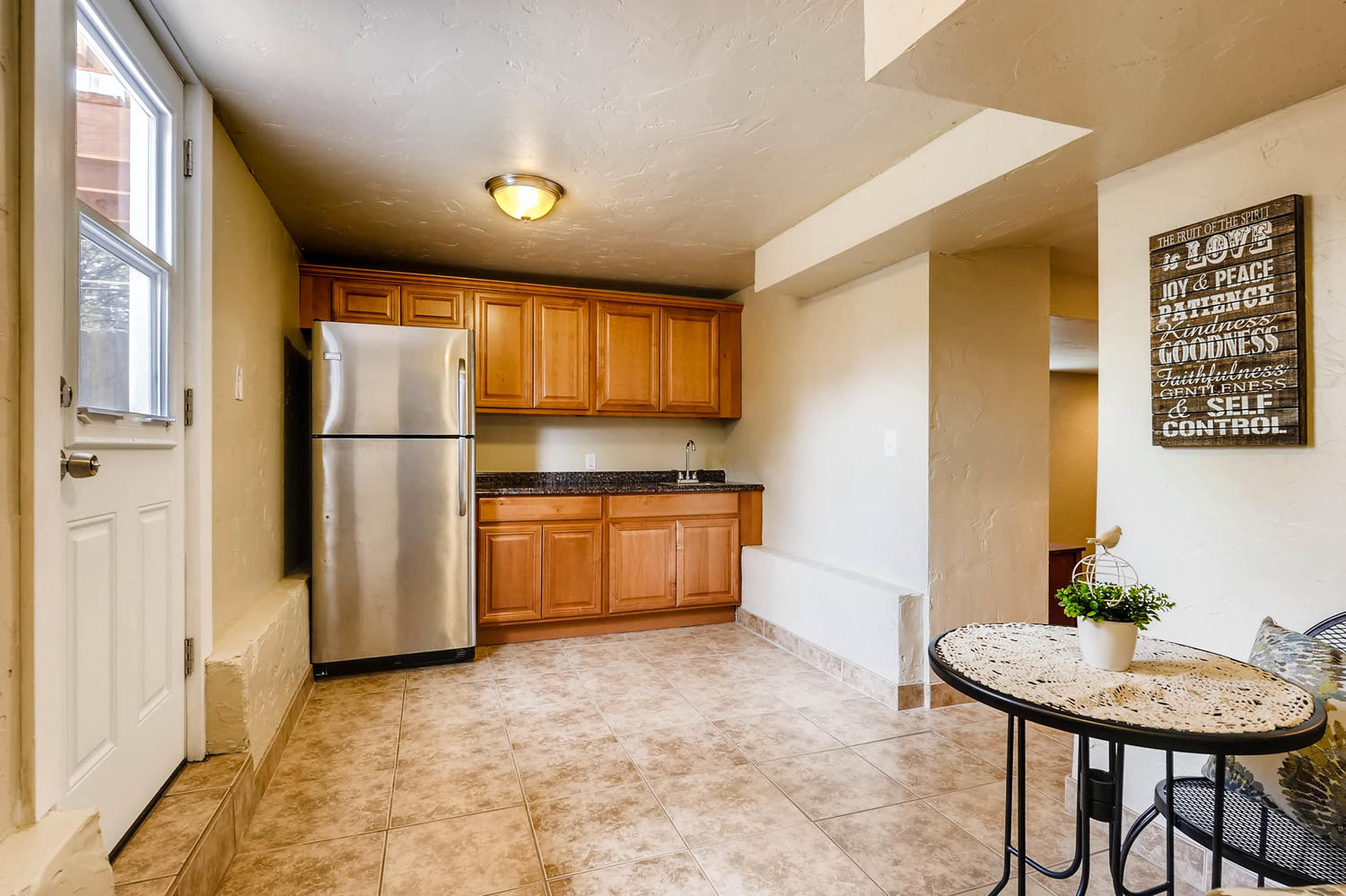 3534 E Bruce Randolph Ave-large-022-17-Lower Level Kitchen-1500x999-72dpi.jpg