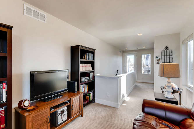 5012 E Thrill Pl Denver CO-small-022-20-3rd Floor Family Room-666x445-72dpi.jpg