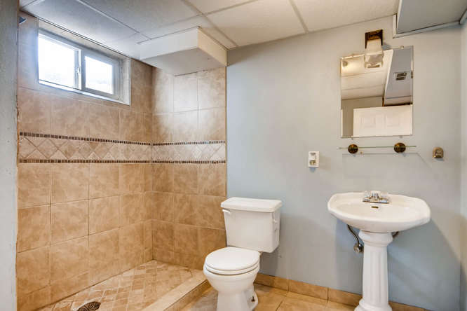 7061 Clay St Westminster CO-small-024-19-Lower Level Bathroom-666x444-72dpi.jpg
