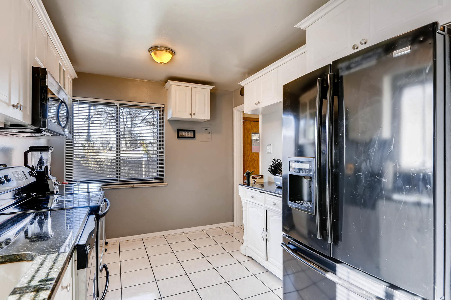 2331 Pontiac St Denver CO-large-008-2-Kitchen-1500x1000-72dpi.jpg