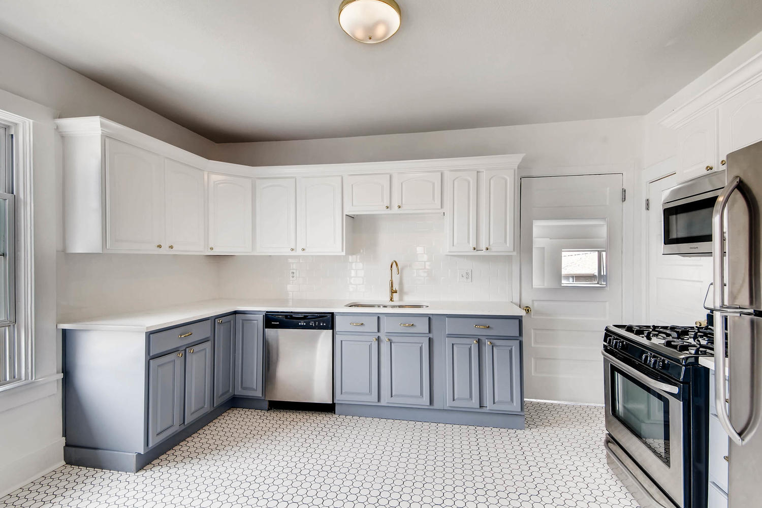 3576 Bruce Randolph Ave Denver-large-008-7-Kitchen-1500x1000-72dpi.jpg