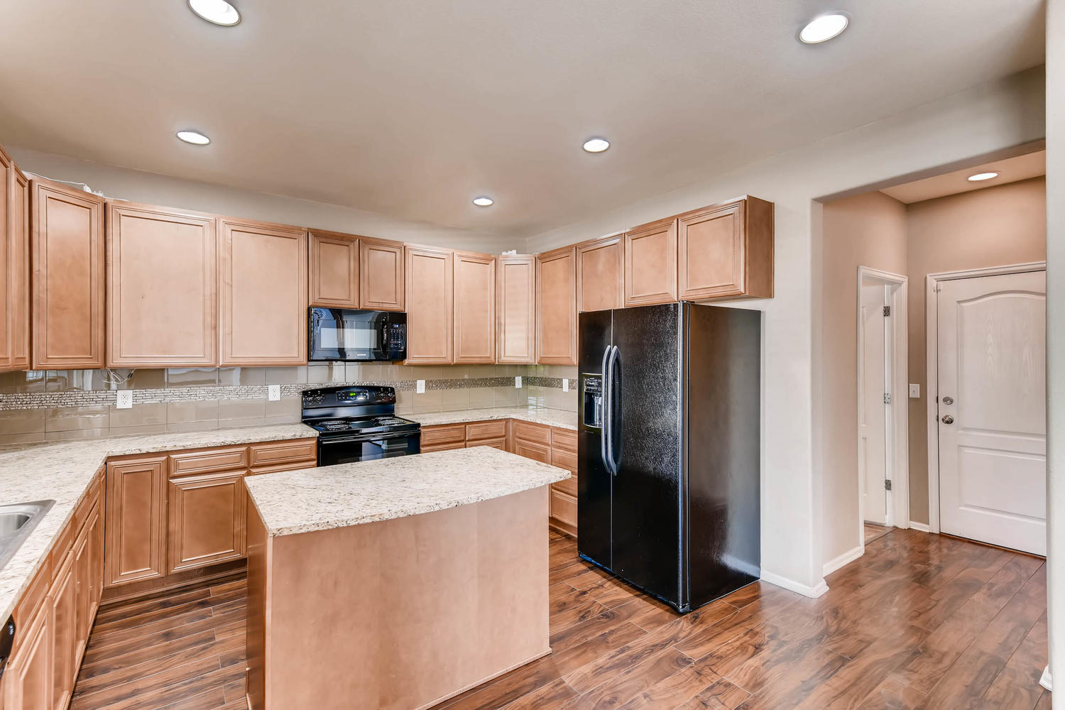 10186 Pitkin Way Commerce City-large-009-16-Kitchen-1500x1000-72dpi.jpg