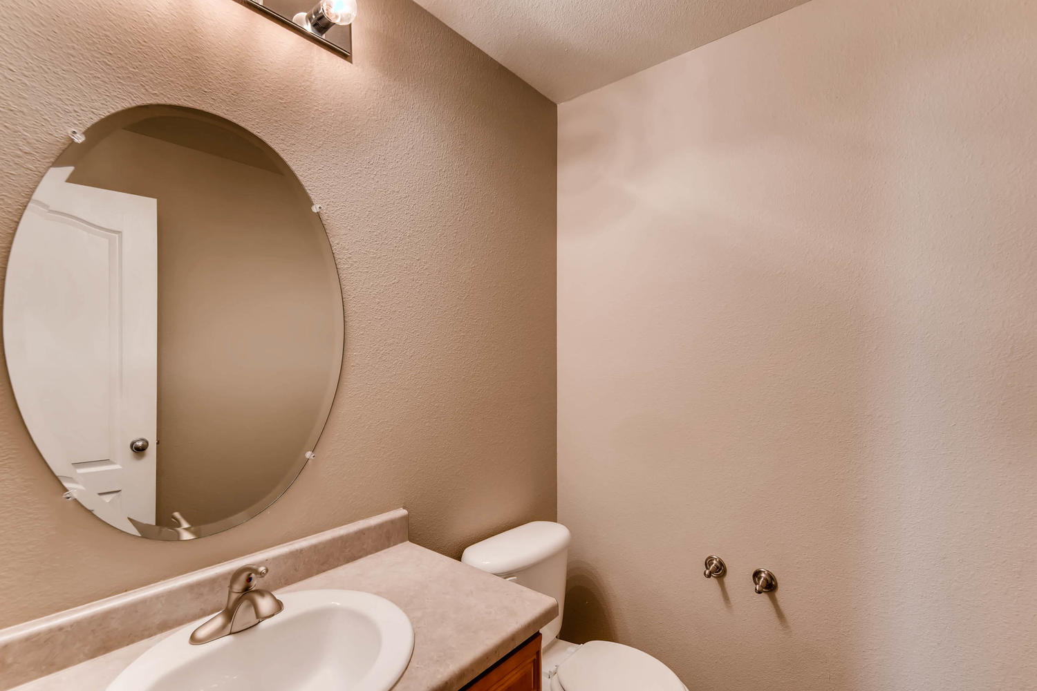 10186 Pitkin Way Commerce City-large-014-18-Powder Room-1500x1000-72dpi.jpg