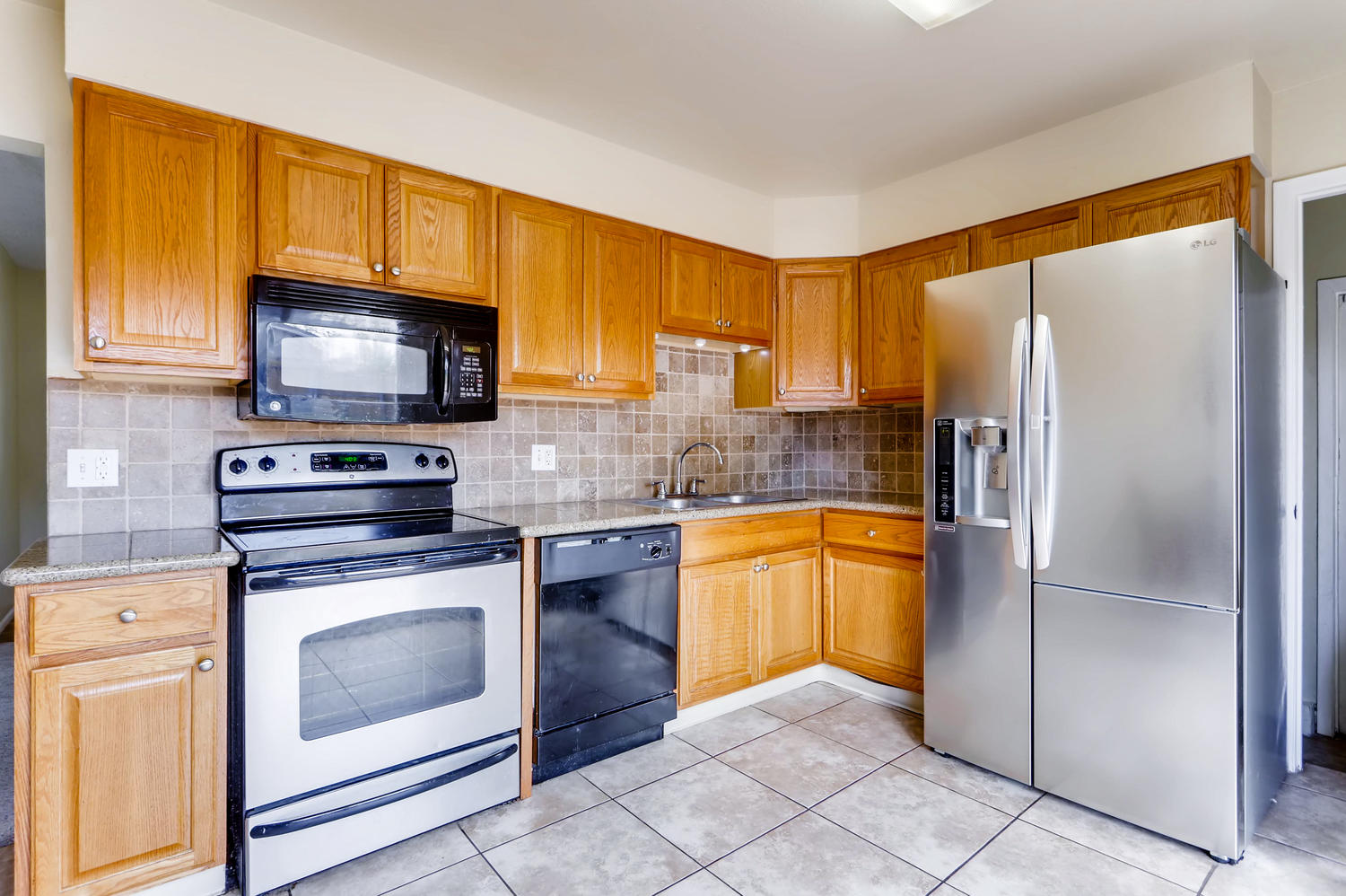 5501 Altura St Denver CO 80239-large-009-11-Kitchen-1500x999-72dpi.jpg