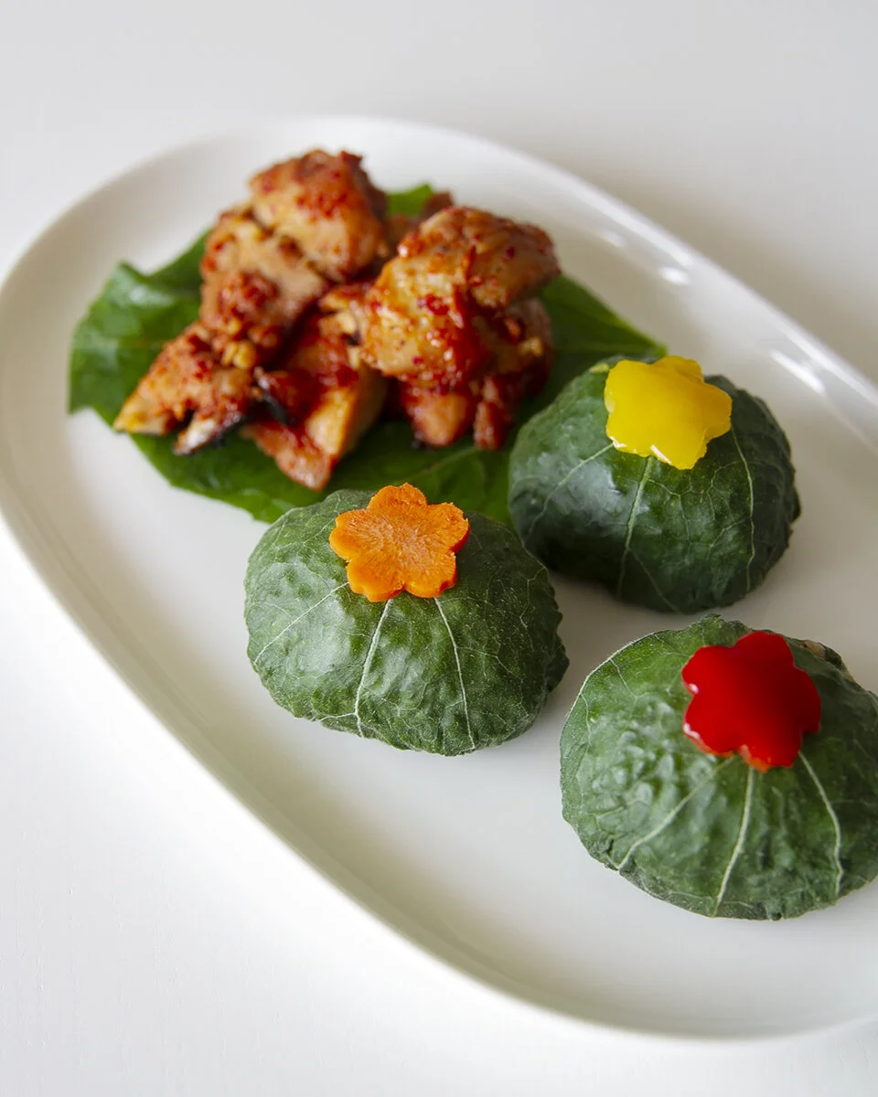 zucchini leaf wrapped rice balls & spicy chickent-square in the kitchen