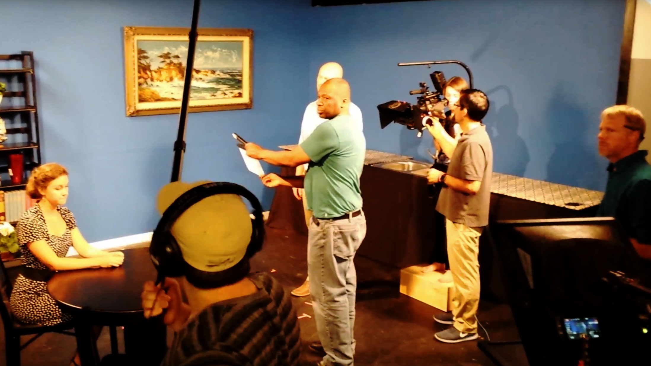 Above: Screen capture from My Father a film for Lebanese audiences by M.A. student Jose Segovia Below: A student crew works with guest director Richard Ramsey during an on-campus intensive