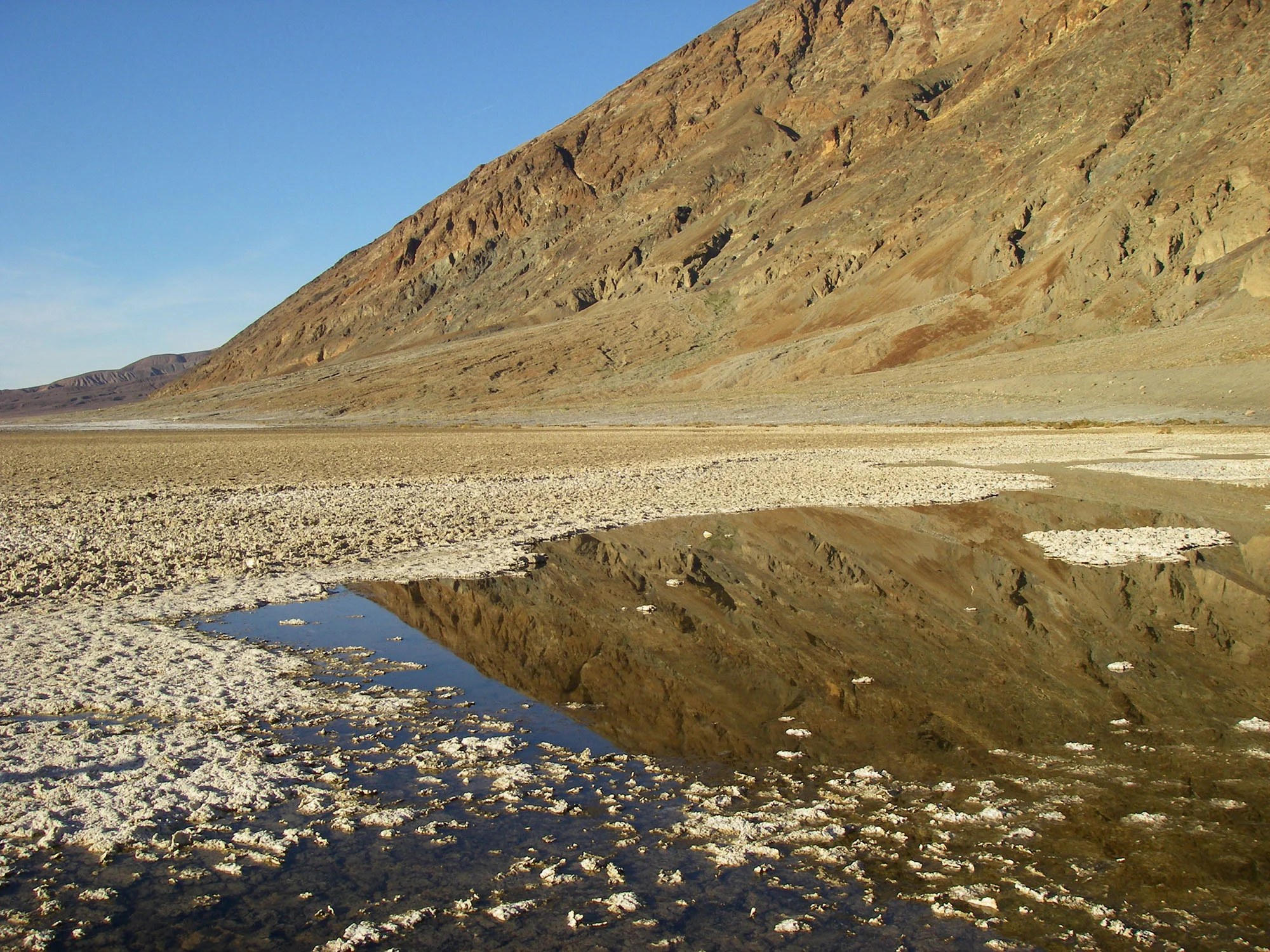 A pool at the edge of the Badwater Basin salt flats. (Image by Emily Benson)