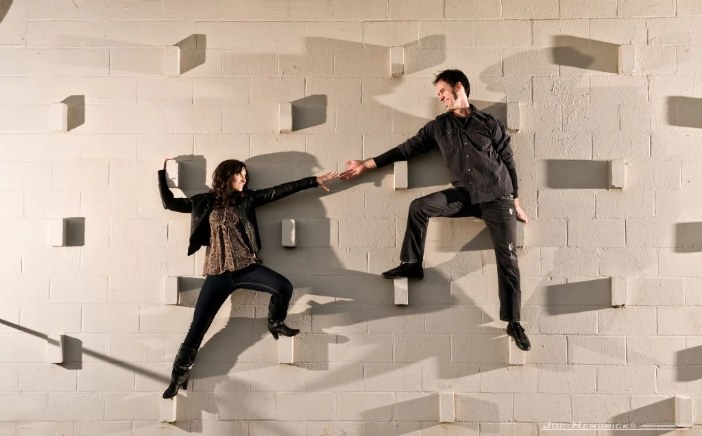 reaching for each other