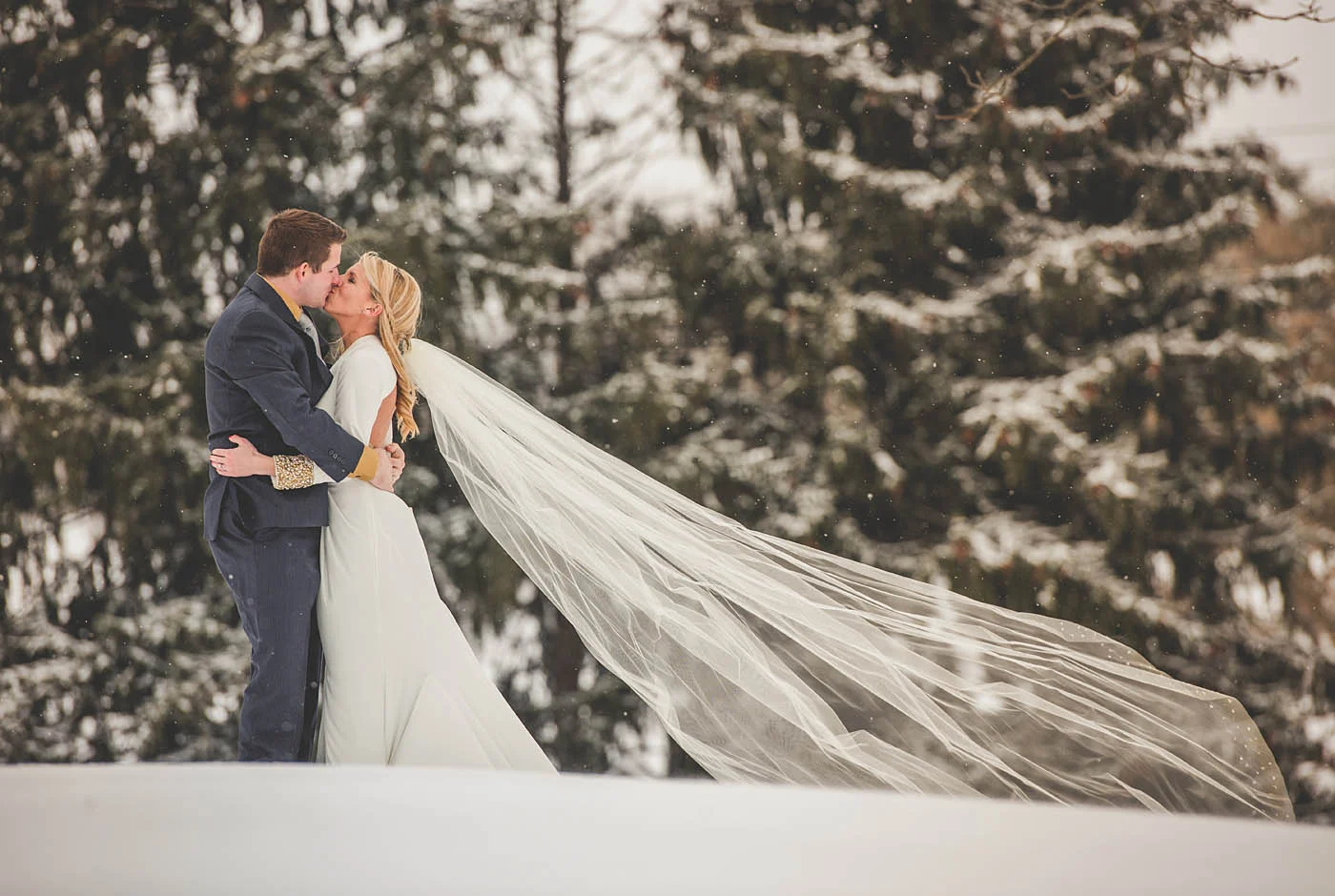 How romantic are these two in the snow!