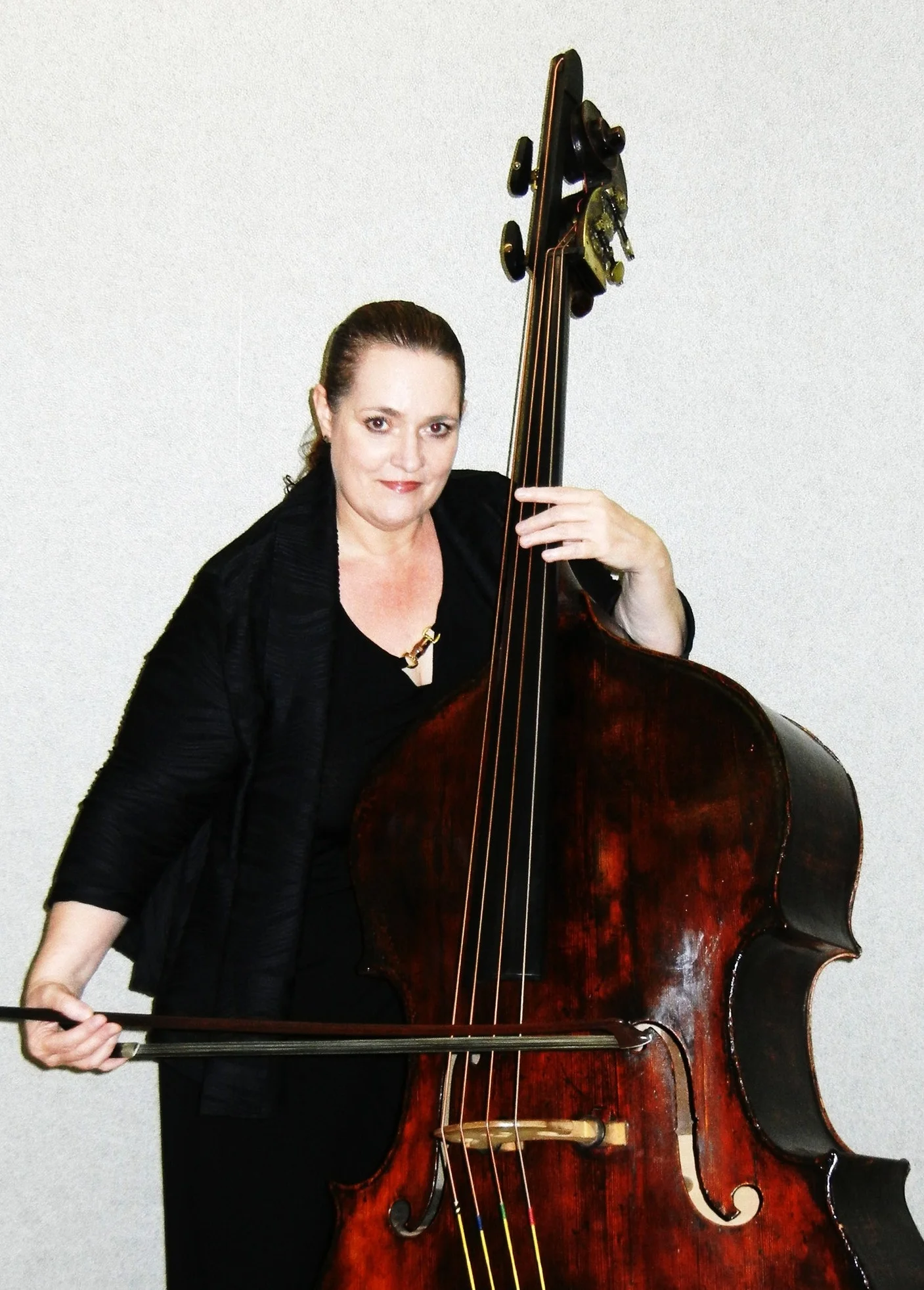 Ms. Slocum holds a Master of Music in Classical Double Bass Performance from the Manhattan School of Music, a Professional Studies Certificate from the Mannes College of Music and a D.M.A. from the State University of New York at Stony Brook. She has attended several master classes with world-renowned bassist Francois Rabbath and has studied his technique. Ms. Slocum's major teachers include Homer Mensch, Julius Levine, Joseph Bongiorno and Joseph Carver. 